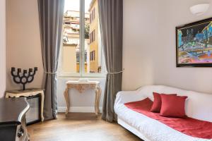 Posteľ alebo postele v izbe v ubytovaní Spagna Art & Suites - CA Domus Collection