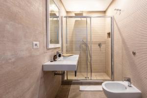Kúpeľňa v ubytovaní Spagna Art & Suites - CA Domus Collection