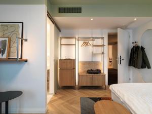 Un pat sau paturi într-o cameră la Hotel St. Josef