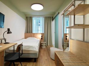 Un pat sau paturi într-o cameră la Hotel St. Josef