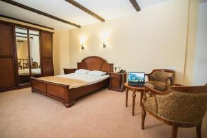 TV a/nebo společenská místnost v ubytování Ruta Resort Polyana