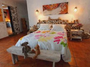 Tempat tidur dalam kamar di La Bodeguita Apartamento Santo Domingo