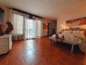 Postel nebo postele na pokoji v ubytování La Bodeguita Apartamento Santo Domingo + 14 fotografií