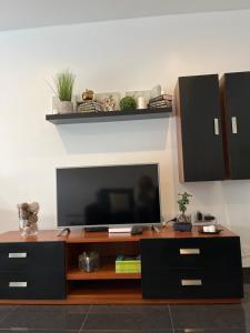 TV a/nebo společenská místnost v ubytování Crystal House