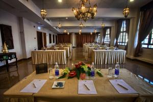 a large banquet hall with tables and chairs at Spice Tree by Turaco in Zanzibar City