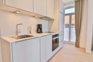 Kuchyň nebo kuchyňský kout v ubytování Lüttjeod - Apartment 13