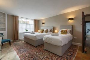 Voodi või voodid majutusasutuse NEW The Green House B&B Cromer Sleeps 20 Hot Tub toas