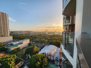 a view of a city from a building at Abode at The Radiance Manila Bay in Manila