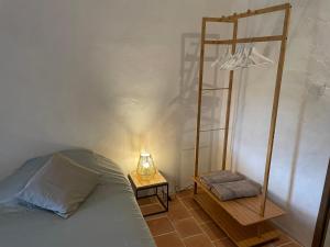 Postel nebo postele na pokoji v ubytování La Bastide