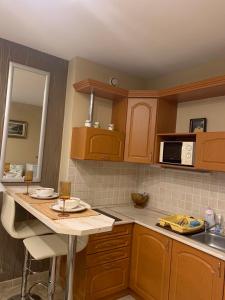 A kitchen or kitchenette at Emi apartman Még 17 kép