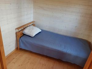Postel nebo postele na pokoji v ubytování Kempings Mežvēji