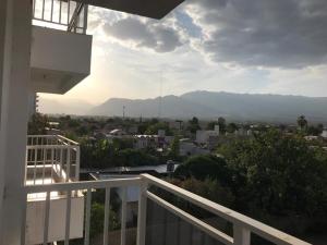 a balcony with a view of a city and mountains at CALMA in La Rioja