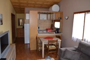 Kuchyň nebo kuchyňský kout v ubytování Casa L'Escala 30