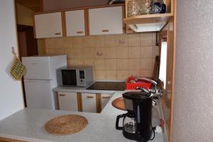 Kuchyň nebo kuchyňský kout v ubytování Casa L'Escala 30