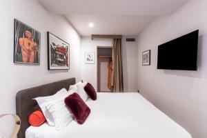 TV a/nebo společenská místnost v ubytování DownTown Boutique House - CA Domus Collection