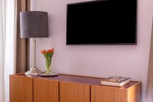 TV a/nebo společenská místnost v ubytování DownTown Boutique House - CA Domus Collection