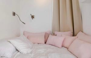 Posteľ alebo postele v izbe v ubytovaní Magnifique appartement avec cheminée sur la plage