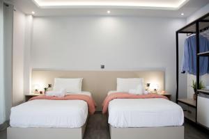 Postel nebo postele na pokoji v ubytování Big Max Guesthouse