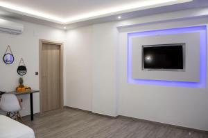 TV a/nebo společenská místnost v ubytování Big Max Guesthouse + 31 fotografií