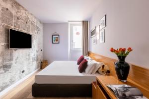 TV a/nebo společenská místnost v ubytování DownTown Boutique House - CA Domus Collection