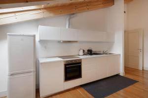 Η κουζίνα ή μικρή κουζίνα στο Apartments Trieste Centro I 1