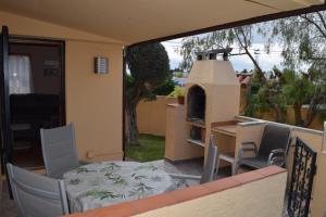 Posezení v ubytování Casa L'Escala 30