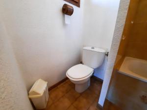 a small bathroom with a toilet and a sink at Studio Saint-Martin-de-Belleville-Les Menuires, 1 pièce, 2 personnes - FR-1-452-319 in Saint-Martin-de-Belleville