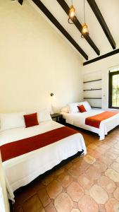 Postel nebo postele na pokoji v ubytování LAGOGRANDE HOTEL