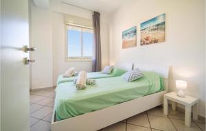 Kép 3 Bedroom Amazing Apartment In Porto Palo Est szállásáról Porto Palóban a galériában