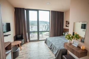 Μια τηλεόραση ή/και κέντρο ψυχαγωγίας στο Hotel Grand View in Tbilisi
