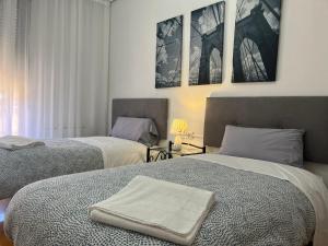 Postel nebo postele na pokoji v ubytování Apartamento Albelda Centro