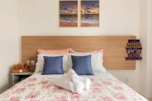 Postel nebo postele na pokoji v ubytování Mana Beach Muro Alto-Flat 12 Ohana e 20 Aloha Térreo Frente Piscina