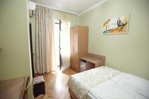 Letto o letti in una camera di Silver Hotel