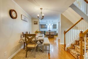 a dining room and living room with a table and chairs at Wilmington Vacation Rental Less Than 2 Mi to Downtown! in Wilmington