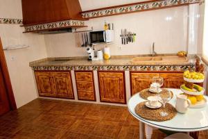 Kuchnia lub aneks kuchenny w obiekcie La Barbería de Miguel
