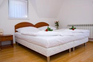 Postel nebo postele na pokoji v ubytování Czerwone Wierchy - sauna i jacuzzi wliczone w cenę pobytu!