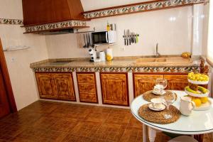 Kuchnia lub aneks kuchenny w obiekcie La Barbería de Miguel