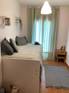 Katil atau katil-katil dalam bilik di La Casita de mimo.