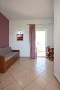 A bed or beds in a room at Mari Helen
