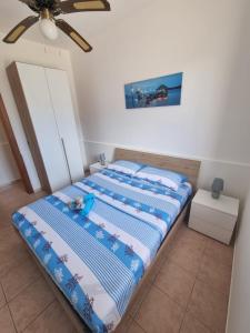 Voodi või voodid majutusasutuse Vento d'Estate - Salento - Appartamento vicino al mare toas