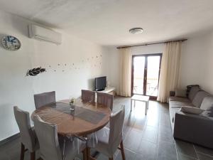 Posezení v ubytování Apartments Devic