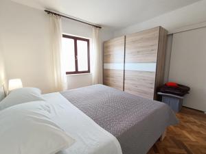 Postel nebo postele na pokoji v ubytování Apartments Devic