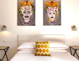 Villa di Nera Apartments tesisinde bir odada yatak veya yataklar