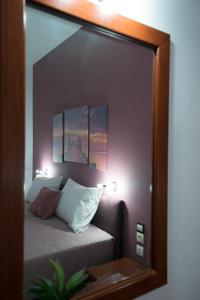 A bed or beds in a room at Mari Helen