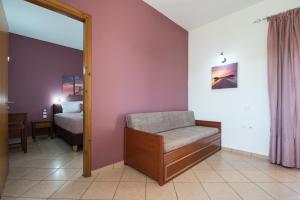 A bed or beds in a room at Mari Helen