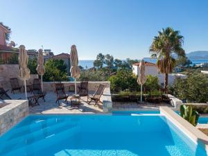 The swimming pool at or close to Dimani Suites