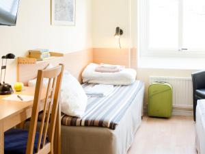 Postel nebo postele na pokoji v ubytování Vandrarhem Svanen
