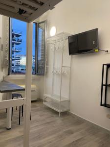 A television and/or entertainment centre at Domus Vacanza Még 8 kép