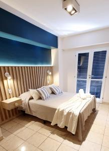 Een bed of bedden in een kamer bij Av Avellaneda - Bon Repos