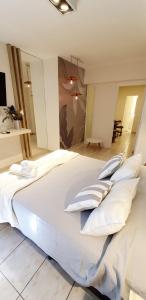 Een bed of bedden in een kamer bij Av Avellaneda - Bon Repos